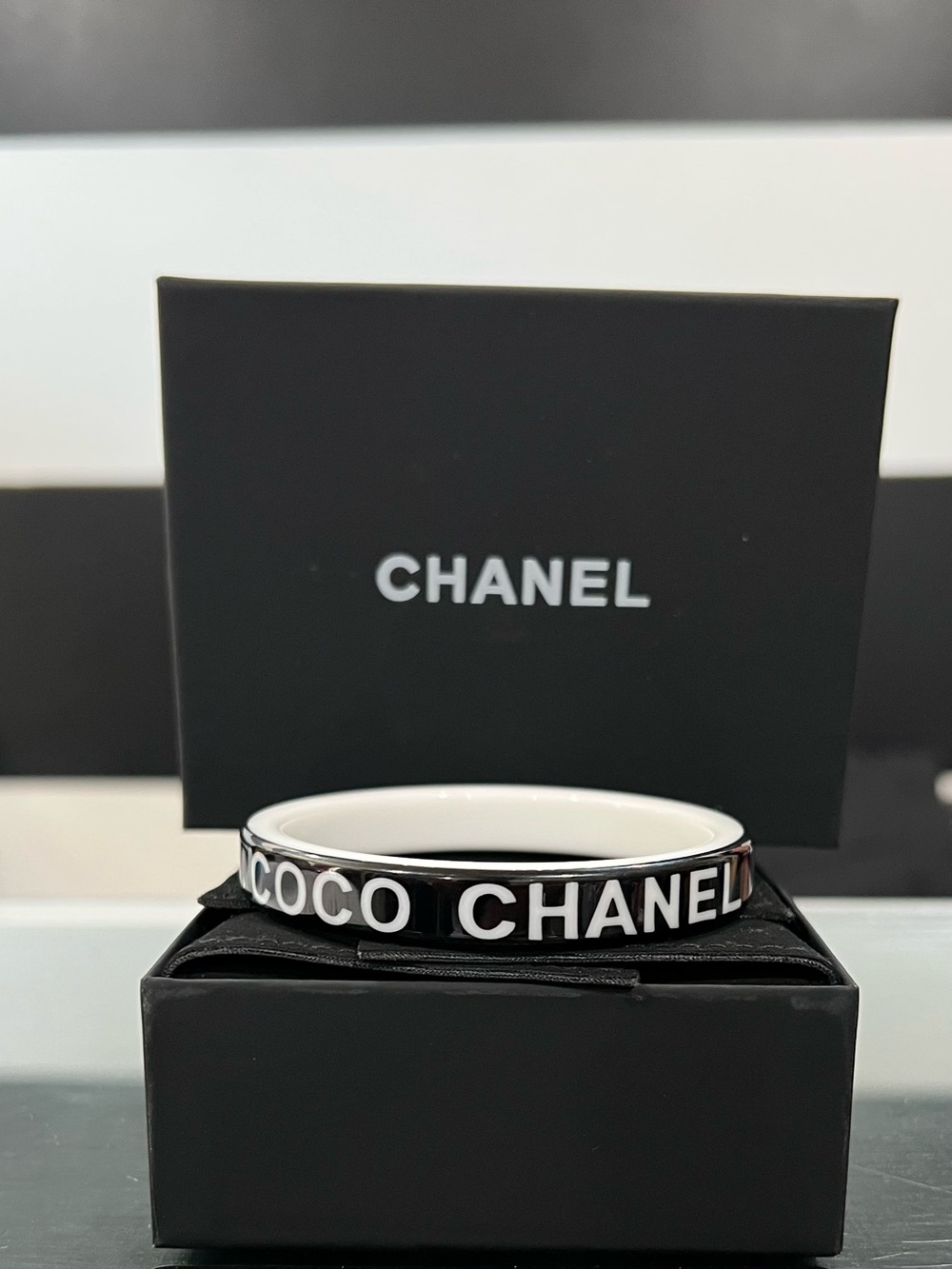CHANEL Black and White 'COCO CHANEL' Logo Bangle